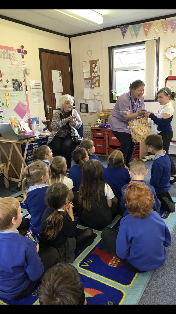 WelbournPrimary's tweet photo. Emerald loved their visit from Joyce and Dawn from Welbourn Manor today! 🥰 There were lots of cuddles for Joyce! 😍 The children received prizes for their Easter bonnet competition with the residents last term. 🐰They also enjoyed showing the tadpoles! 🐸 #community #Welbourn https://t.co/8lpsYbYl3E