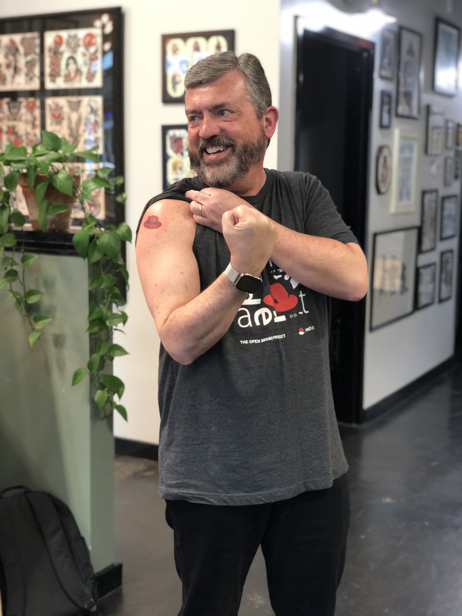 RedHat's tweet image. Our logo represents our work out in the open with global communities to make #opensource the default technology and philosophy of the 21st century. Heck, just ask people who have it tattooed on their body, like... @tbyeaton! 💪🏽 #RHSummit #OpenBrandProject