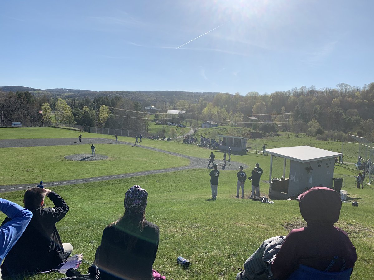 Now at Aidan’s @MHS_Solons baseball game in Williamstown where the visitor’s dugout is up the hill from the field. #vermontbaseball
