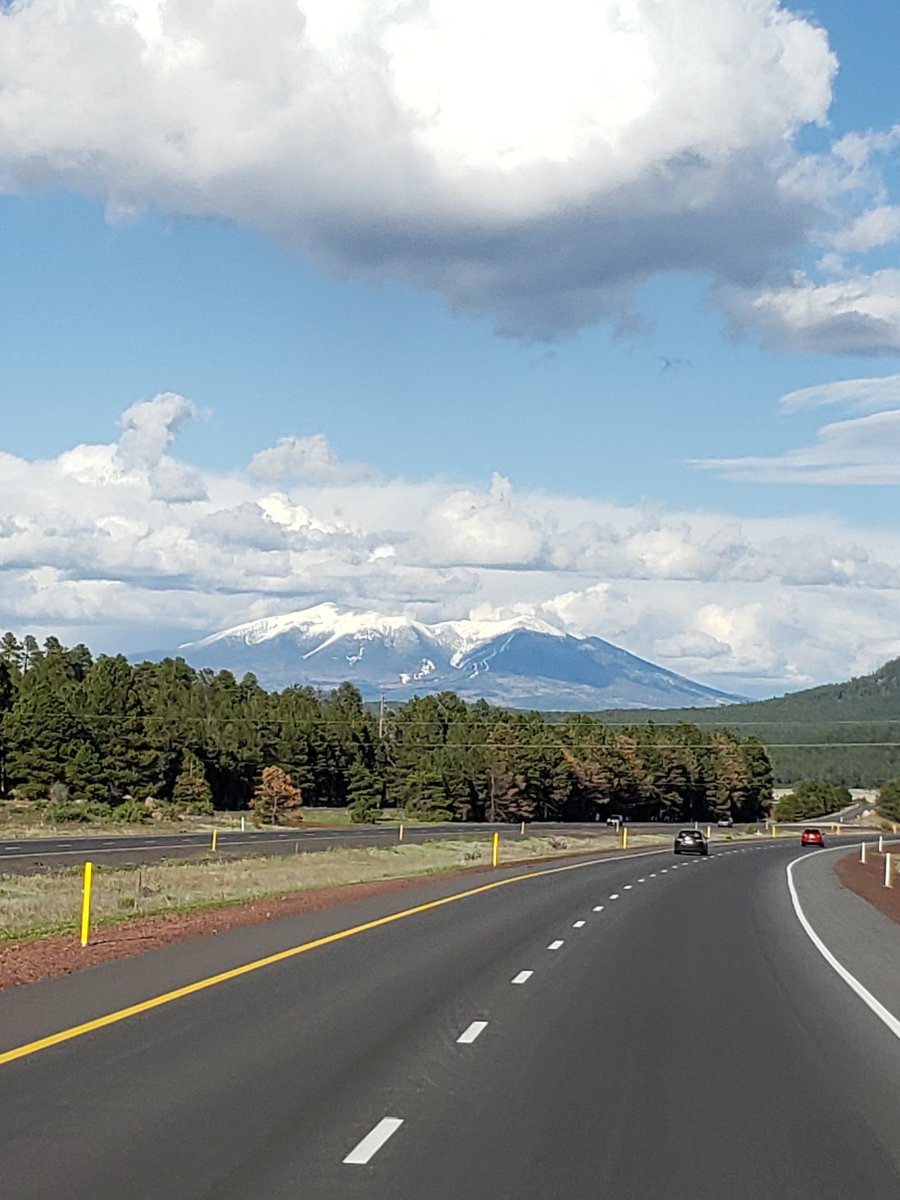 My job has the best views! #trucking #trucker #womanintrucking #Arizona #snowypeak #photography