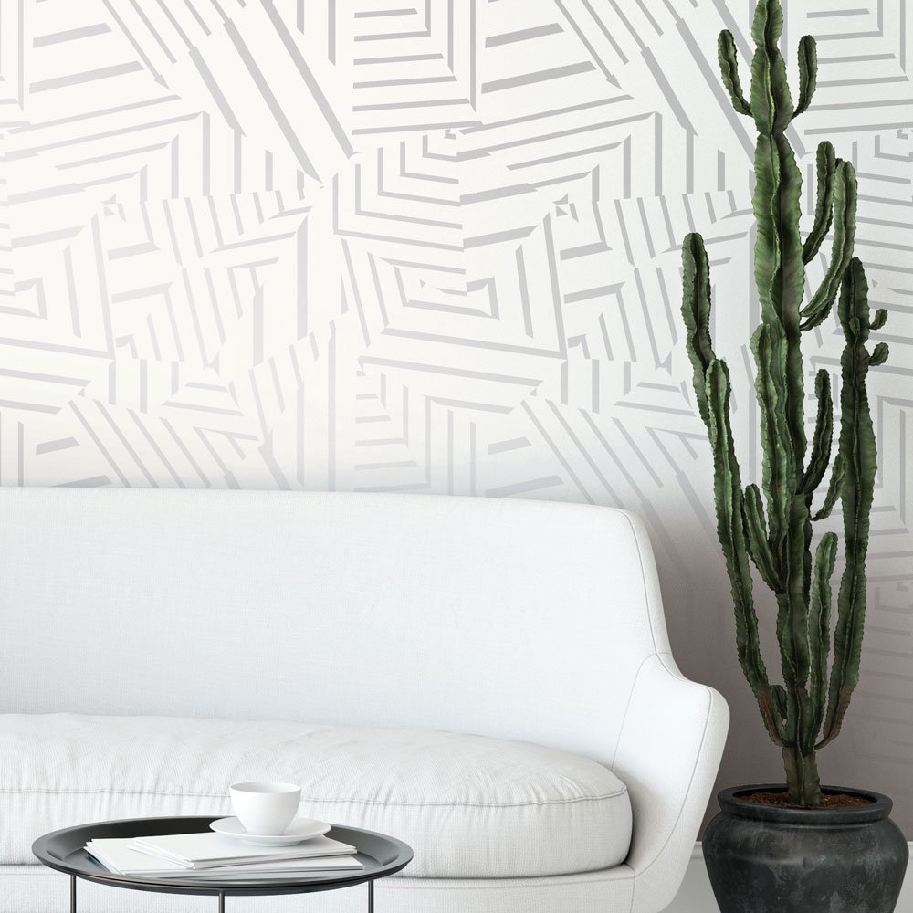 Tempaper's tweet photo. Fragmented pieces converge in a flurry of intersecting line work. Broken, but never shattered. Dazzle is part of the @Bobbyberk Collection. https://t.co/Yk6Bd7lha0 #tempaper #bobbyberkxtempaper #removablewallpaper #metallicwallcovering #tempapryourspace #livingroom https://t.co/FG70BqAIu2
