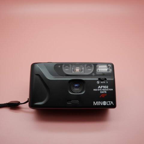 : Minolta AF102 DatePoint and shoot film camera with a 34mm lens, red eye reduction, and quartz date. Pretty lightweight for a pns camera. #NCT카메라  #WayV  #WeiShenV  #威神V #HENDERY  #黄冠亨  #Minolta