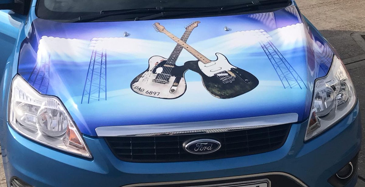 StatementGsLtd's tweet photo. The team completed this really cool bonnet wrap last week. It's really unique and definitely makes the car stand out from the rest! 🎸🎸#carwrap #vinylwrap #bonnetwrap #vehiclewrapping #carcustomisation https://t.co/ODTRDJ0Ew9