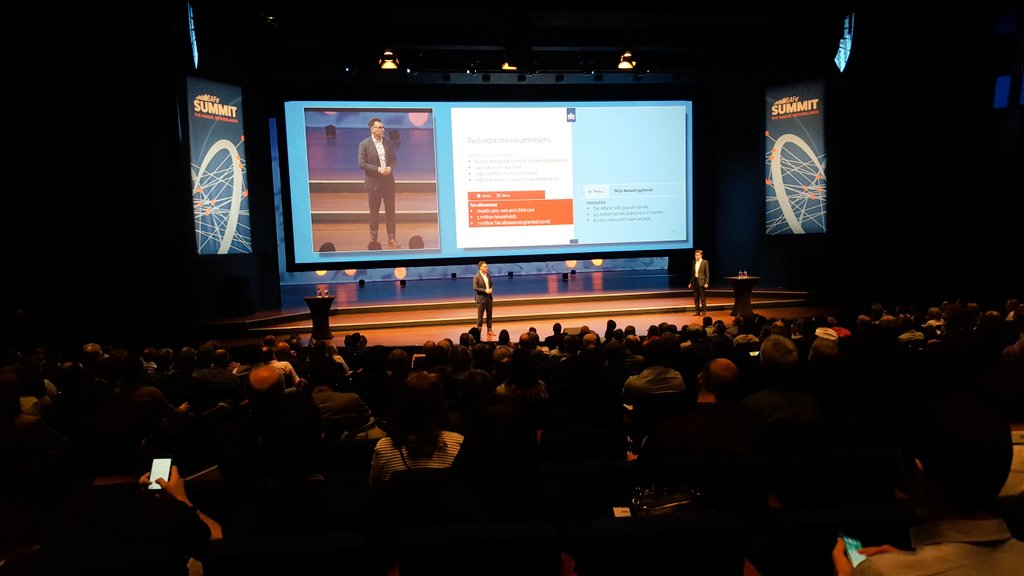 Leenmovies's tweet photo. 'Stay between the Blue lines.' #message of the #belastingdienst at the #SAFeSummit next to that one of ' #SAFe works, but its still work of humans'. #SAFeSummit #inspearit #thehague #agile #lean https://t.co/oWD9xUByo2