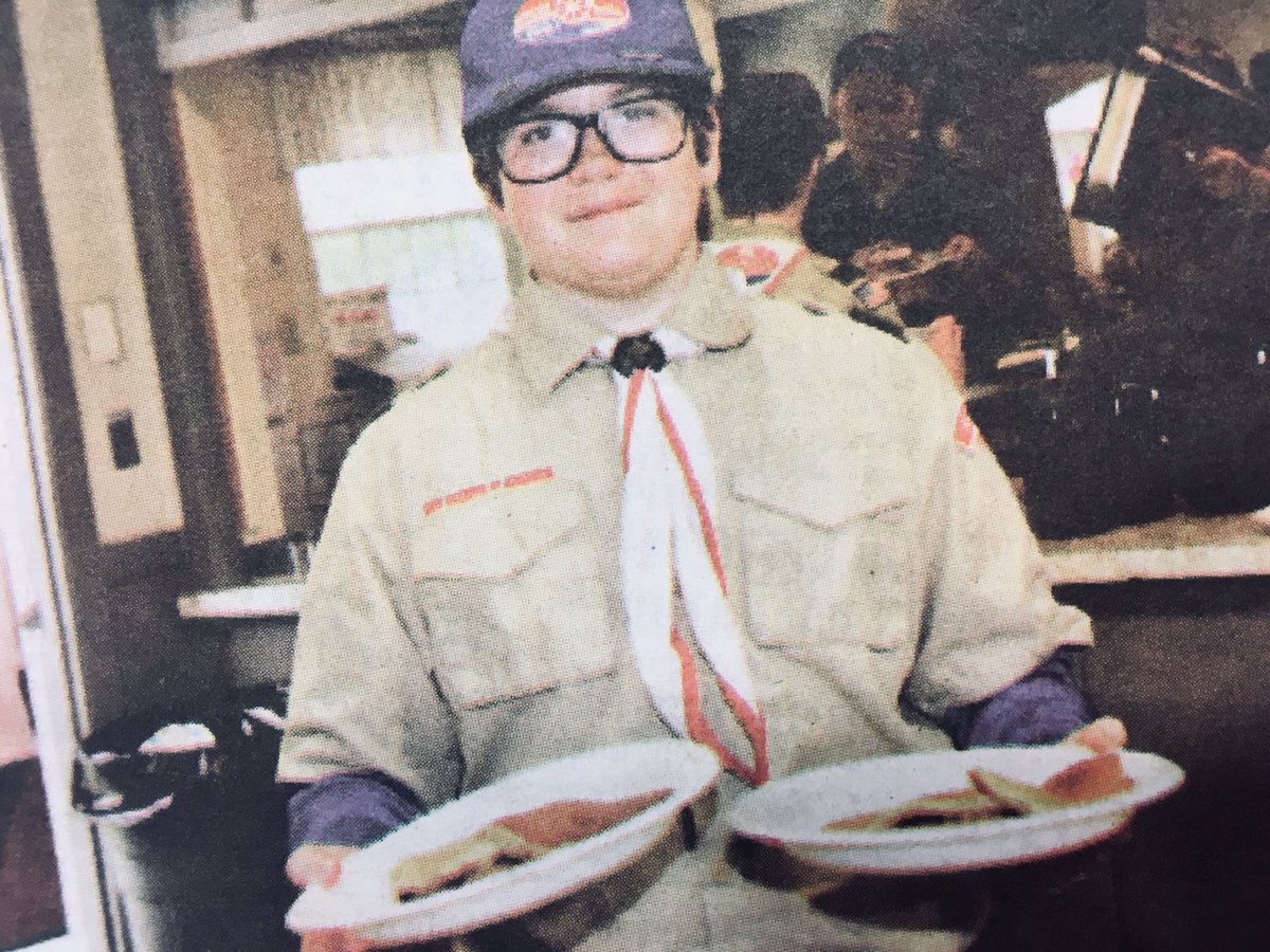 Michael Hancock, a member of the Arnold Mills Boy Scout Troop 1, delivers food at the troop’s all-you-can-eat Pancake Breakfast.  <a href="/gobluechs/">Cumberland High</a>