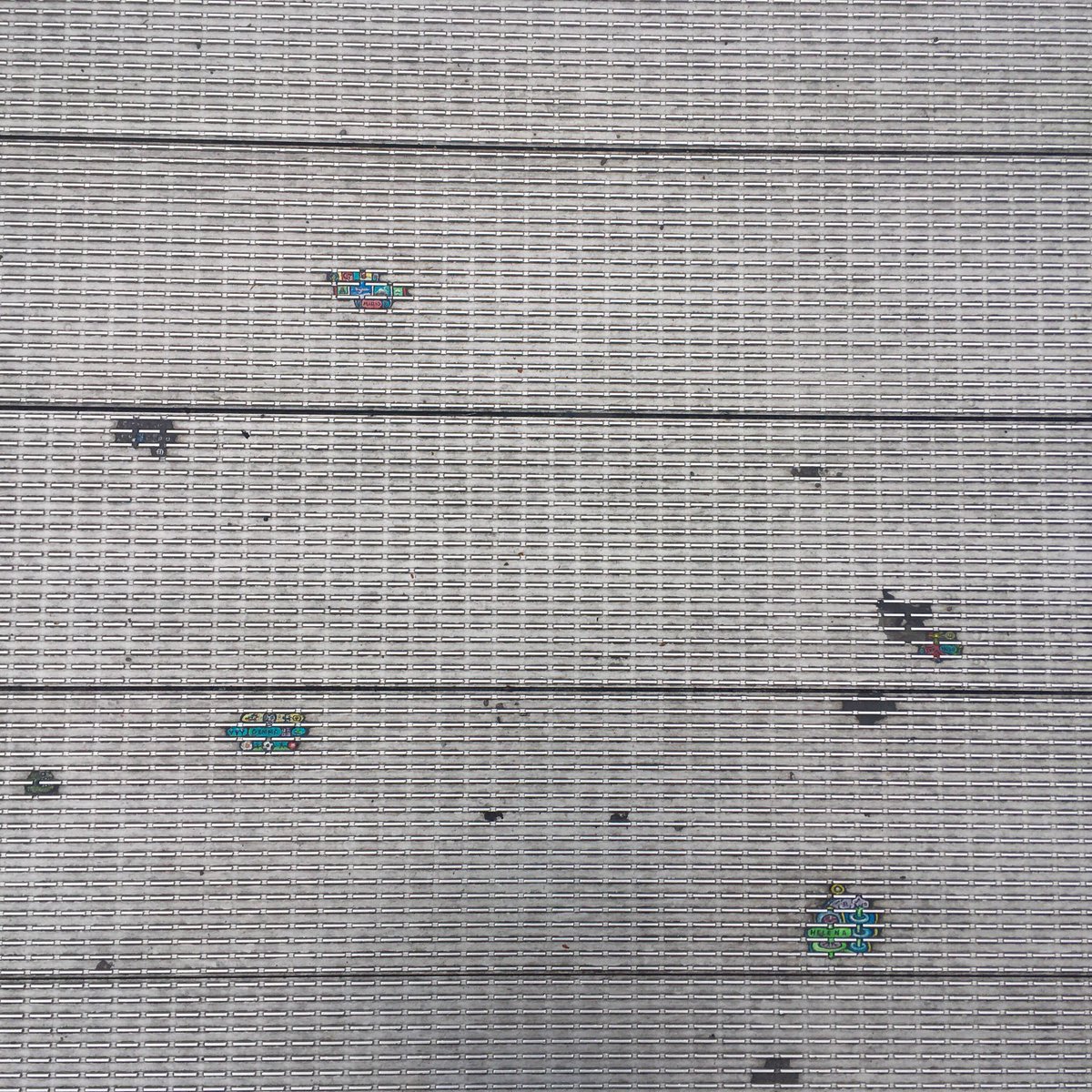 WillSandyDesign's tweet photo. When you are walking over the millennium bridge on a grey and wet afternoon. Itβs nice to look down and notice that someone has taken the time to make small artworks on all the chewing gum! #london #art #nottate https://t.co/uuM2opXYor