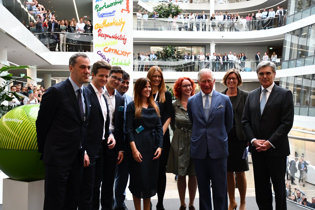ClarenceHouse's tweet photo. The Prince also toured the Atrium of the new @Siemens Headquarters to hear about the company’s principles and sign the Siemens Golden Book. 

#RoyalVisitGermany https://t.co/yYigaEboG1