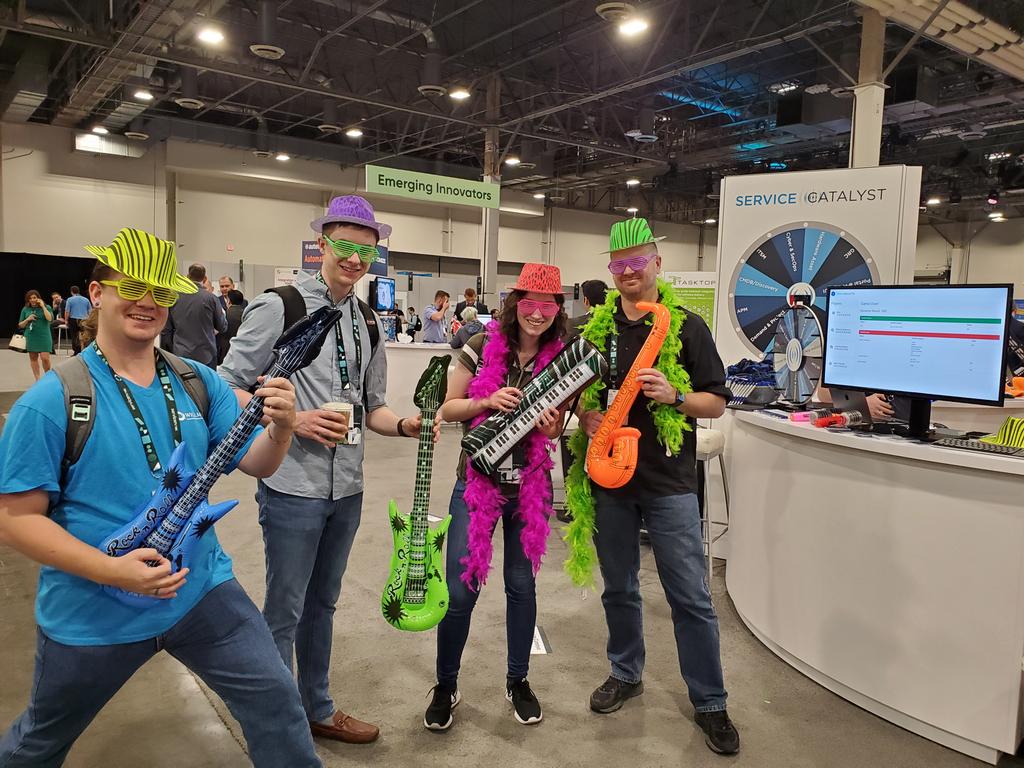 servicecatalyst's tweet photo. We are jamming out at the conference!  Come visit us at Booth E20 for a chance to Rock! #Know19 #ServiceNow #serviceportal #rockingout https://t.co/caR2EQbuBn