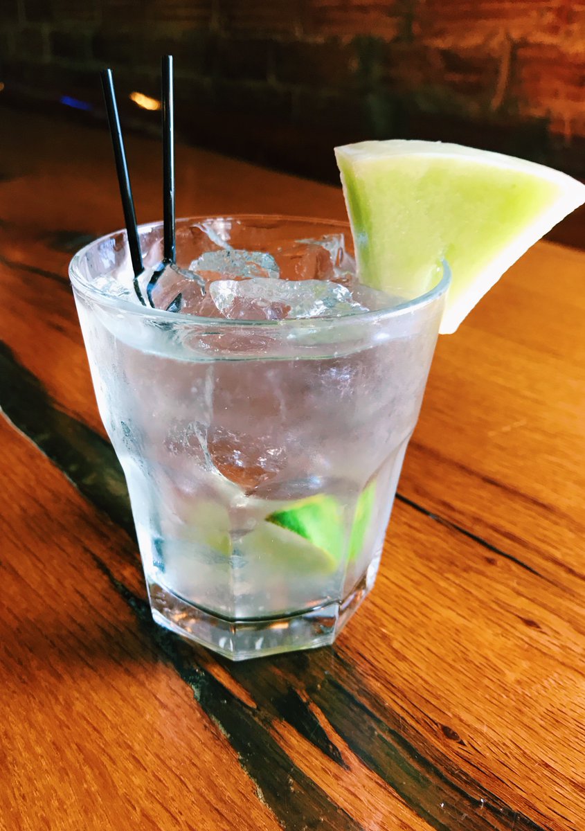 TrainWreckBar's tweet photo. Fresh drink on our special board! Come in for a Vanilla Bucha-Mule, $8. Made with 
Vanilla vodka, fresh lime juice &amp; Happy Mountain’s Honeydew Kombucha—served over ice with a melon wedge. #trainwreckbarandgrill https://t.co/vjA2V438Um