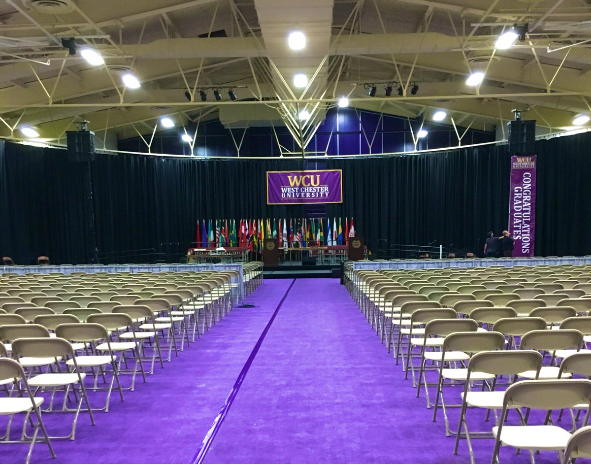 WCUofPA's tweet photo. The stage is waiting for you, Golden Ram Grads 🐏💜🎓 #WCUgraduation https://t.co/Sq04m5uBqJ