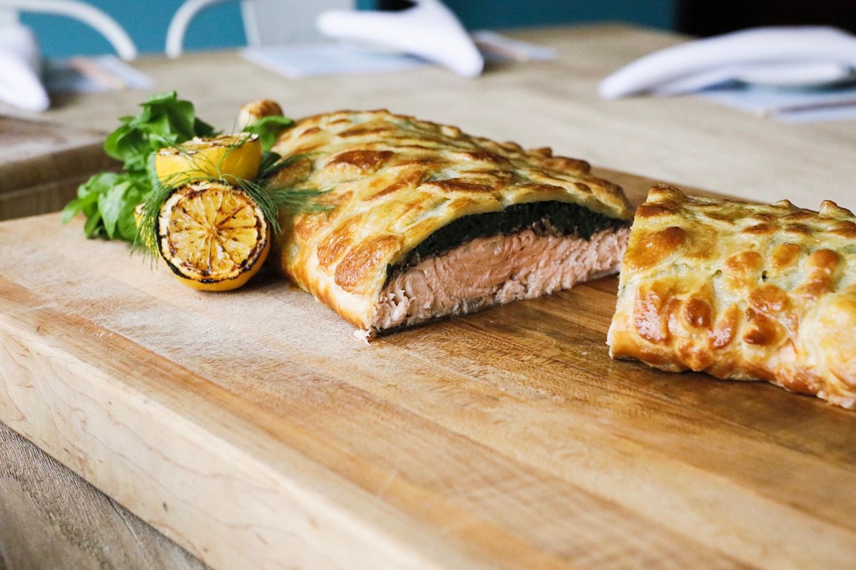 Try our Salmon en Croute served with mushroom fricassee and wilted greens exclusively in the Side Room at Saltie!