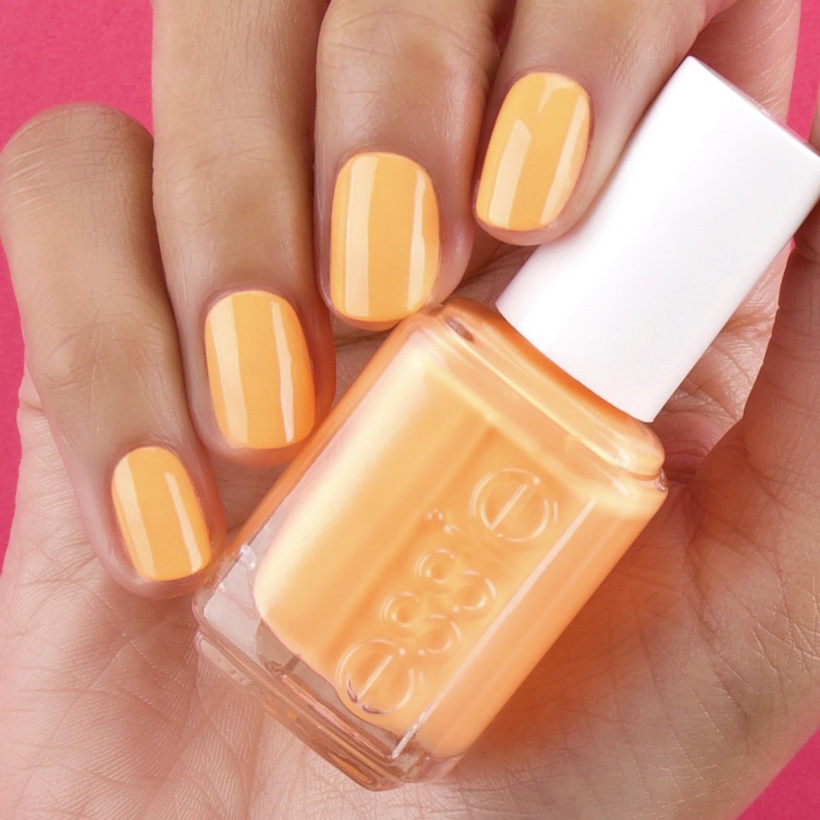 essie's tweet photo. feeling fiery? this new tangerine orange shade #solesonfire is the neon you need this summer 🔥🔥🔥 #essiesummer2019 https://t.co/eglmzBpS19 https://t.co/7XWNrwKVww
