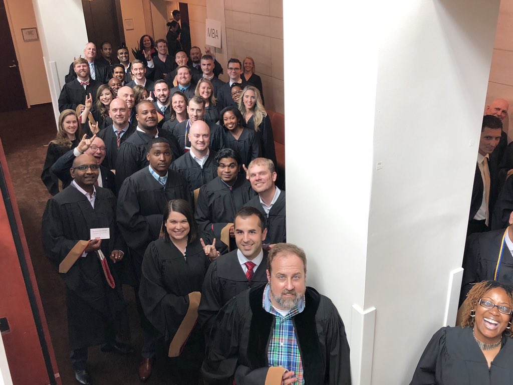 NCStateMBA's tweet photo. These #NCState19 #MBA grads are all smiles. 🎓🐺🐾 https://t.co/zUJhN8FkDw
