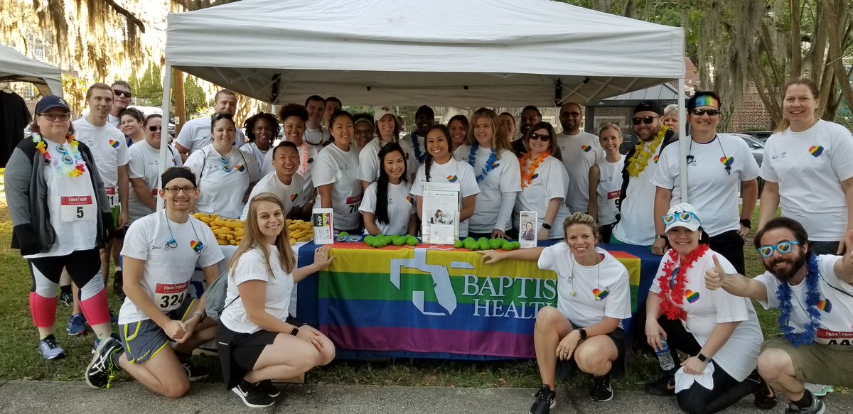 BaptistHealthJx's tweet photo. #TBT Thank you to all of our team members who got up early to run, walk or volunteer at this year’s @JASMYNJax #stridesforpride5k🌈 on behalf of Baptist Health! And congrats to #BaptistSouth PACE Nurse Lynn Asp for placing first in her age group! #BaptistPRIDE #BaptistProud https://t.co/ROrfROp8n0