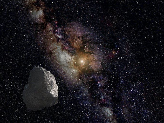 artist impression of a Kuiper Belt object (KBO),floating in space with stars in the background