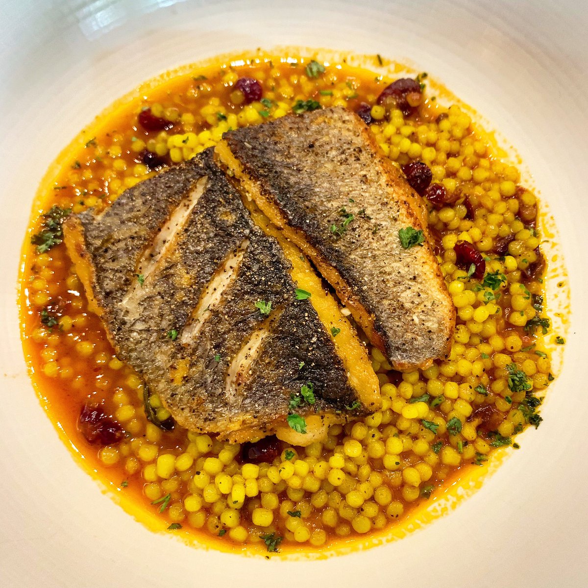 Chef Andrew Black has fresh fish flown in multiple times a week at <a href="/BlackWalnutOKC/">Black Walnut</a> like tonight’s branzino with Israeli couscous. Amazing food and beautiful presentation. #GregBites <a href="/DeepDeuce/">Deep Deuce District</a> <a href="/VisitOKC/">Visit OKC</a> <a href="/DowntownOKC/">Downtown OKC</a>