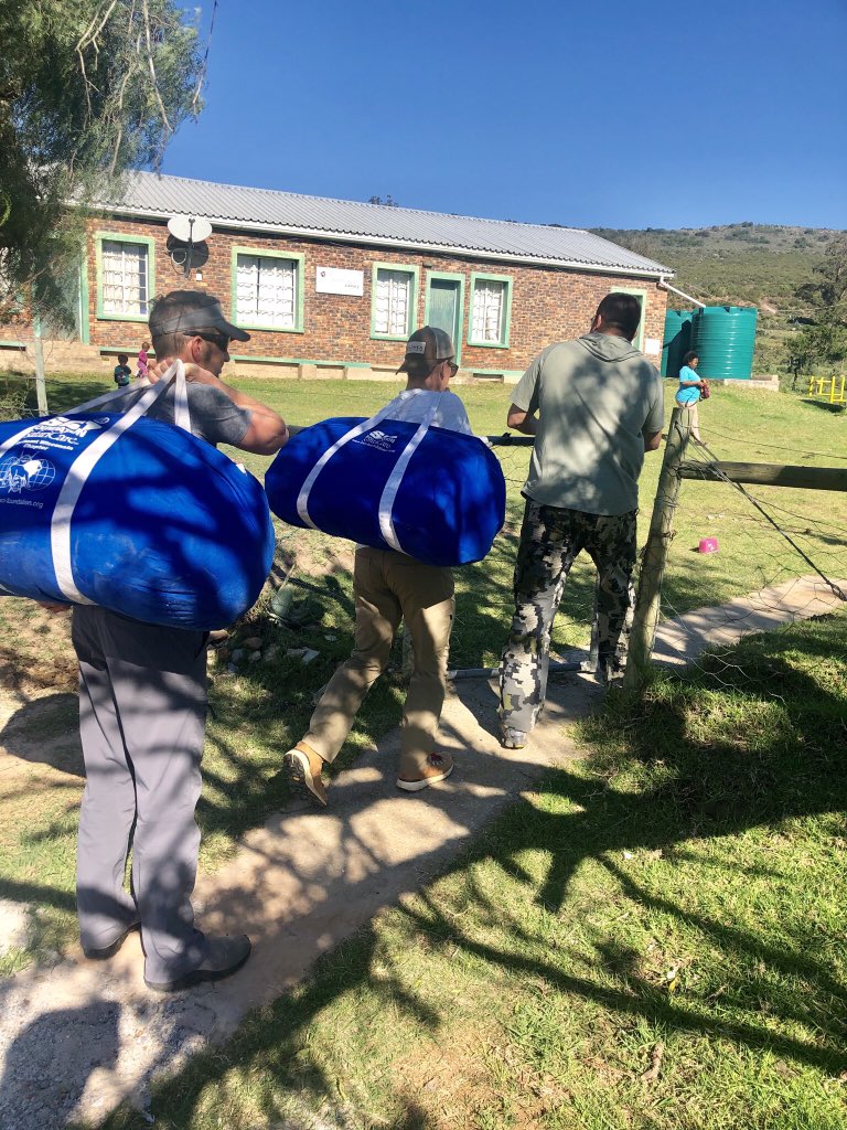 tjwTweinhold's tweet photo. Likely the pinnacle of our African experience. This small rural elem. school struggles to survive each day &amp; doesn’t have electricity. We brought 2 large duffles full of toys, clothes, supplies &amp; packs to share with them. The kids went nuts over our gifts and company! #goosebumps https://t.co/o8zUvCBFIx