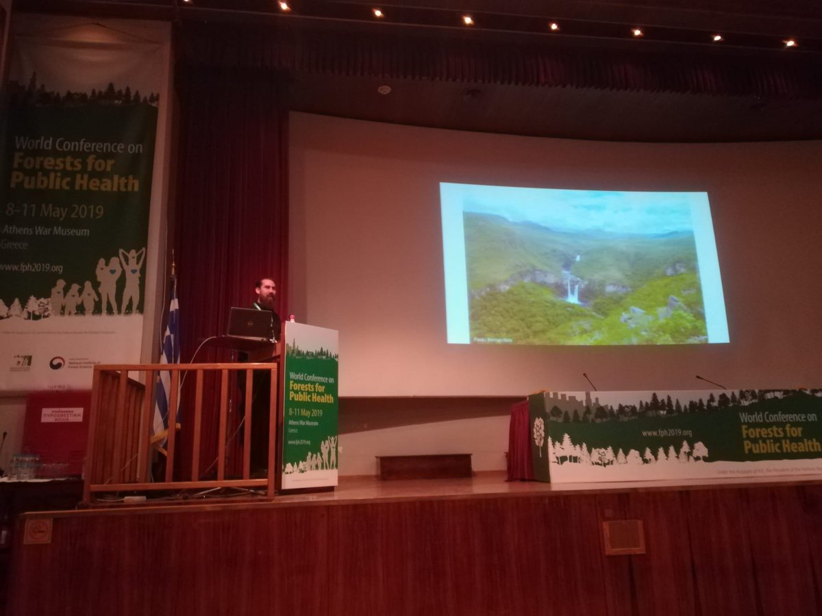 dForNatLan's tweet photo. Michiel Stas just presented at the World Conference on Forests for Public Health in Athens. He showed that residential exposure to forests is beneficial for allergy sufferers as long as allergenic tree abundance is low. 🌳🏙️🌳
#fph2019 #reseco #landinforman #RESPIRIT https://t.co/7s2cCFYJr5