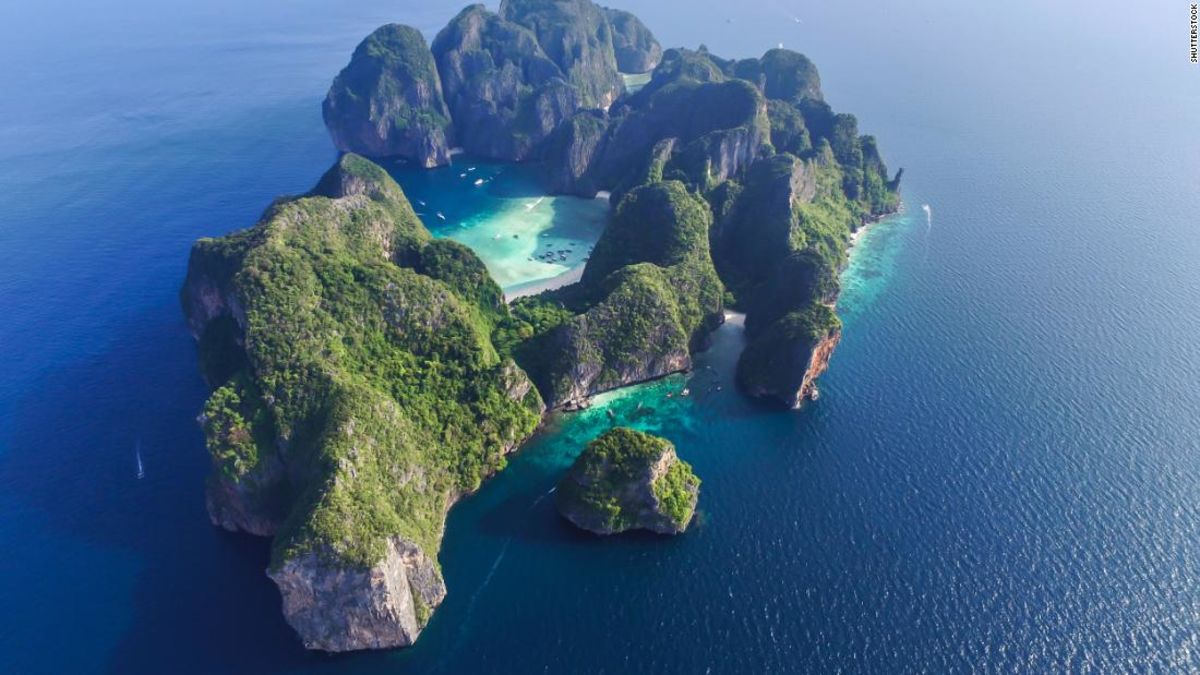 CNN's tweet photo. Thailand's stunning bay made famous by "The Beach" is going to remain closed for two more years to allow its natural resources to regenerate https://t.co/PiwopnYvMt https://t.co/aDFivt7O3a