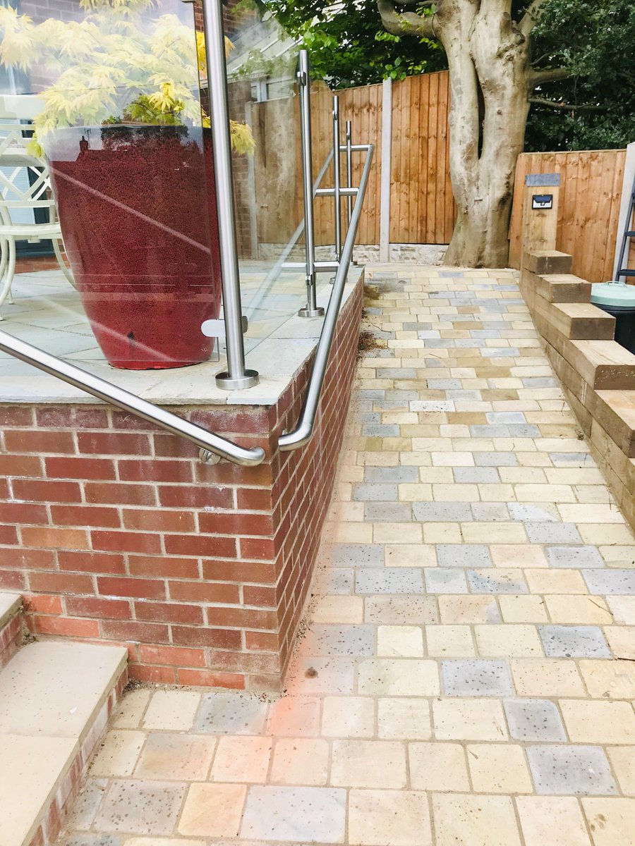 Something for the weekend...

How about a semi we erected, a semi-frameless glass balustrade? c/w with angled ramp handrails for seamless access to this beautiful garden terrace, it's a cost-efficient method of getting it up, so we can get off and leave you to love your garden.