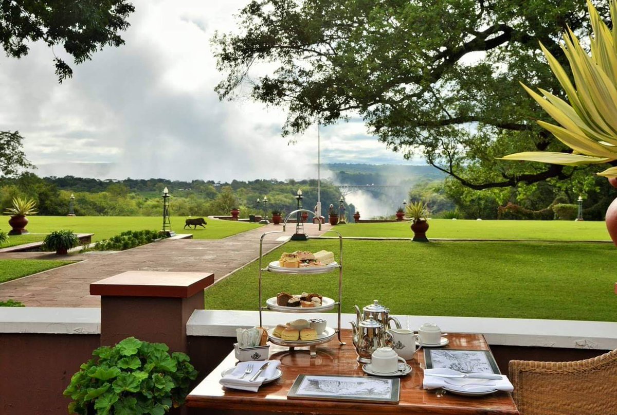 Nothing beats High Tea at The Victoria Falls Hotel with this amazing view. Tag a friend you would love to experience this with :)  #tvfh #tvfhmoments #hightea <a href="/WetuTravel/">Wetu Tourism Solutions</a> <a href="/WeAreWilderness/">Wilderness</a>