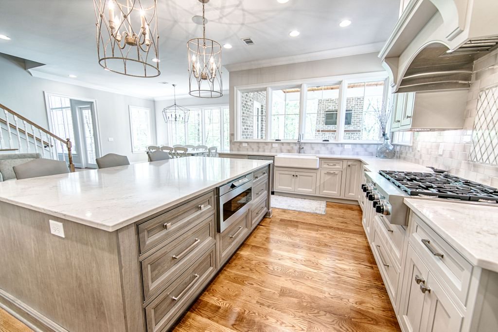 We love a good statement pendant over the island ❤️ 
.
.
.
.
.
.
#tcd #kitchen #interiordesign #kitchendesign #bespokecabinetry #bespoke #toulmin