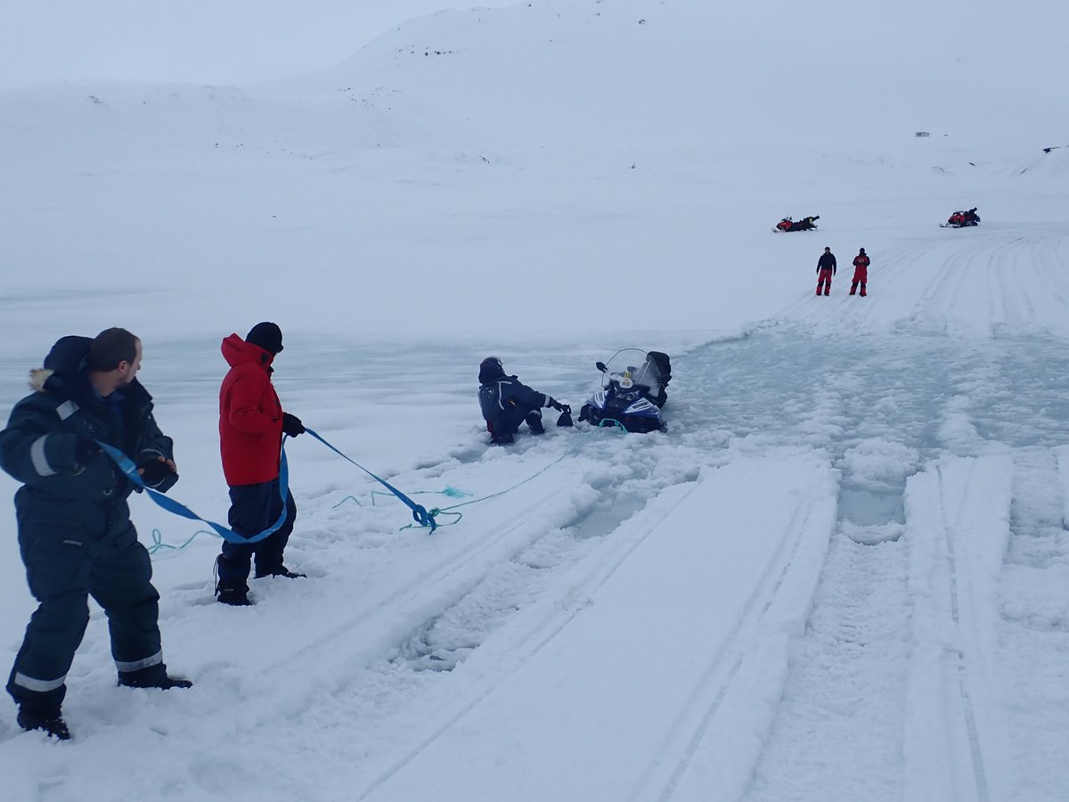 Winter rain events in the Arctic can cause lots of problems for scientists. Read more about it on #Instagram: instagram.com/p/BxR8dXigLrJ/ 
#sunkensnowmobile #arcticrain #rainonsnow #nyalesund #svalbard #npolar #research #polar