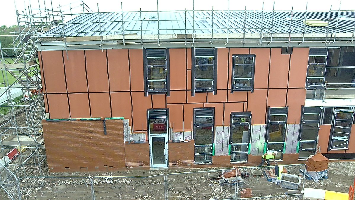 StTheresasICL's tweet photo. Another shot of the brickwork and external windows. First fix partitions and M&amp;E progressing very well too #StTheresas #construction @IRVconstruction https://t.co/5h7Fddg37K