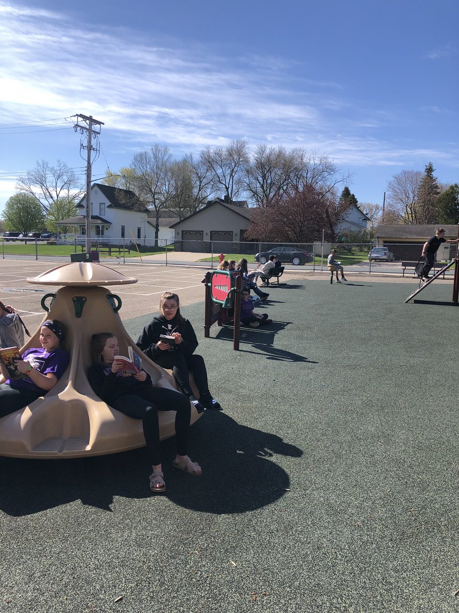 Soaking up the sun and enjoying some reading on this beautiful Friday! #GoodhueSchool
