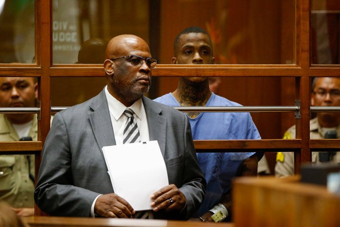 Chris Darden withdraws as Eric Holder's attorney