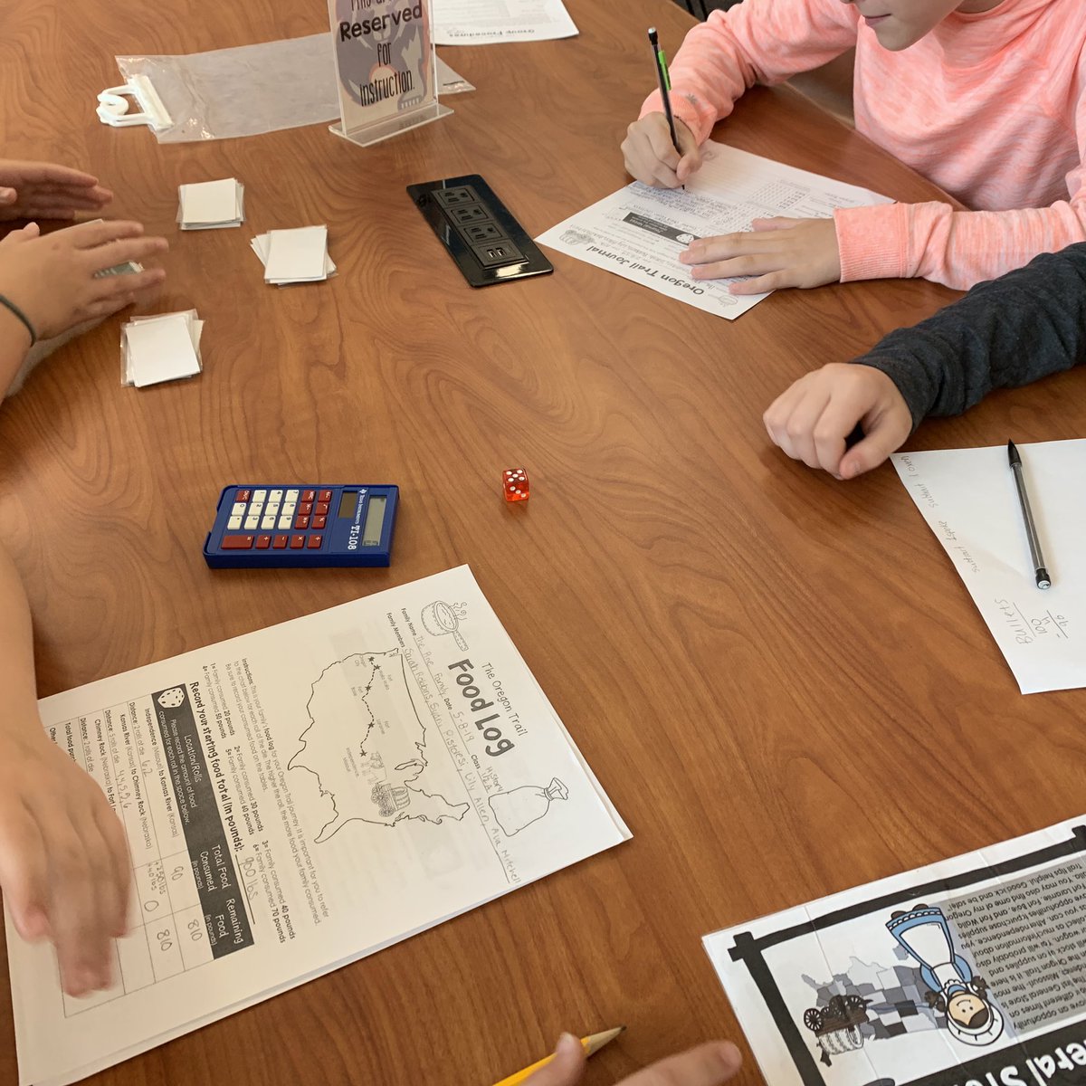 BAM_Library's tweet photo. Learning through games! This week, #6thgradehistory @BAM_MS_Official students needed to work together to create a budget and negotiate the dangers of our #oregontrail simulation game. #playtolearn #bamyr2 https://t.co/Sketj1Vc1q