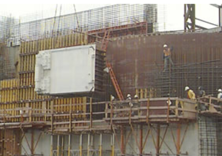 laserdriver's tweet photo. NIF's largest neutron shield door weighs 120,000 lb, It is 14 ft wide, 9 ft high and 6 ft thick. It was fabricated in Pennsylvania and had to be installed during construction of the target bay because of its giant size. It is used to enter large test objects.  #HugeDoors https://t.co/0NTjcRo2FN