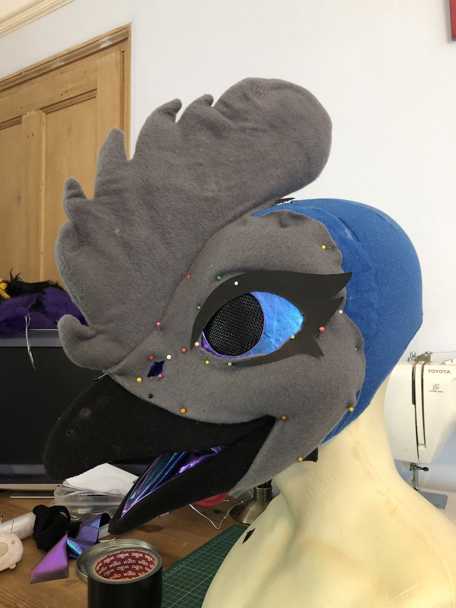 TheShmonster's tweet photo. A bit late for #feathersuitfriday but progress on Tikka! The holographic fabric is a pain to work with but I love how it looks! I might change her comb though...🐓

#fursuit #fursuitmaker #fursuitwip #furry #birdsuit https://t.co/5JCBe5Fqsx