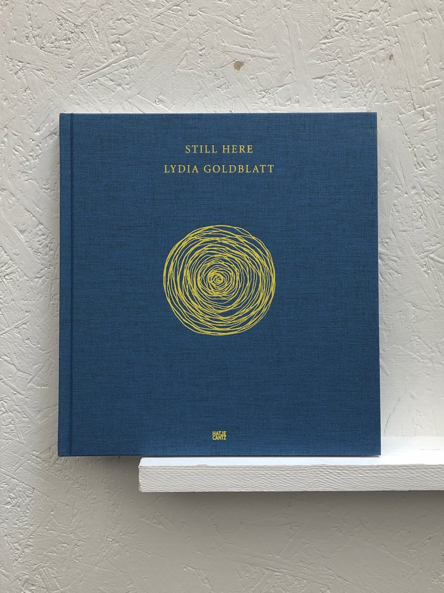 'Still Here' by <a href="/LydiaGoldblatt/">Lydia Goldblatt</a> is available in our shop. Pop in and pick up a copy.