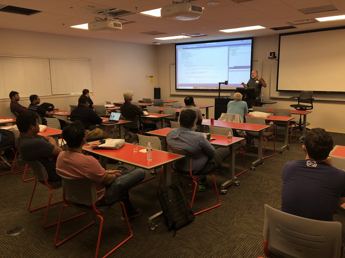 joshcarlisle's tweet photo. Switching it up from my own talk at #AzureGlobalBootcamp a couple weeks ago. Now I’m in the audience and it’s @DougWare turn to share the goodness of @AzureFunctions #DurableFunctions at @SPS_Atl . Absolutely killing it and he’s even got a slide of MC Hammer and Fabio in there! https://t.co/dHjDKuKnYa