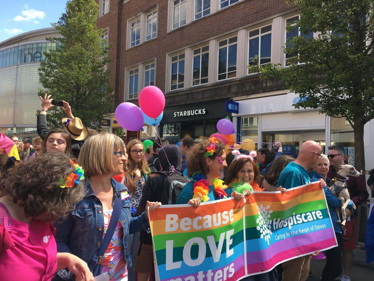 maggieexeter's tweet photo. The proud ⁦@Hospiscare⁩ team dancing ⁦@ExeterPride⁩ in the sunshine today - great end of life conversations #compassionatecare #openingaccess https://t.co/AzA1p8pg6r