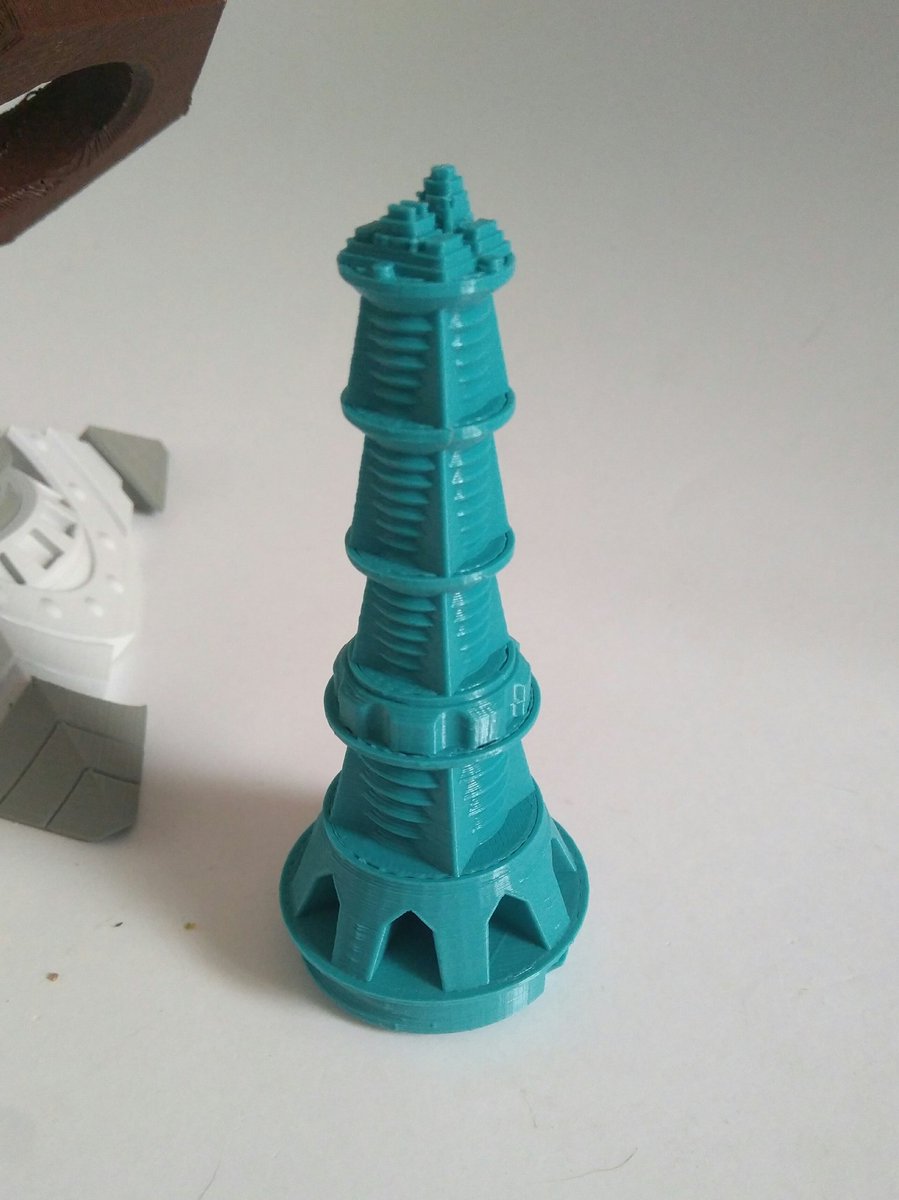 ferjerez3d's tweet photo. Day 11..... Tallest tower so far. #municipalmay #everydayacity #procedural #openscad #3DPrint using @Fillamentum turquoise blue https://t.co/Trr4fnlGW7