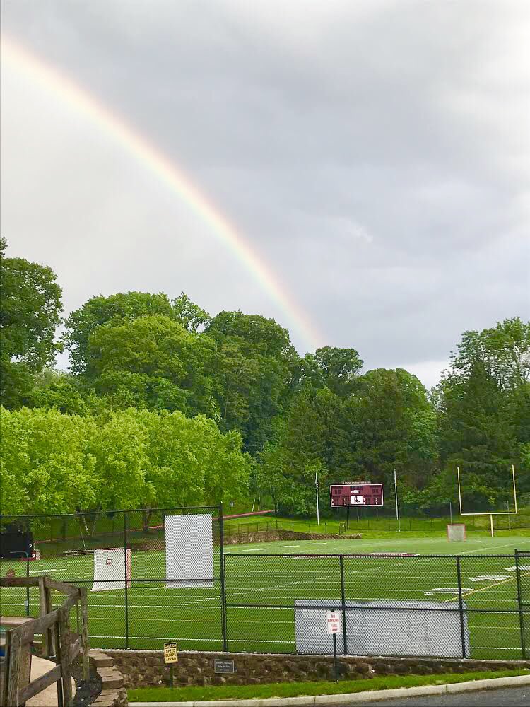 BoysLatinSchool's tweet photo. After our Varsity Lacrosse team won the quarterfinals,  a rainbow spread over campus. A sign? We think so. Come out and support the boys Tuesday at Johnny Unitas Stadium 7 pm when they take on Saint Mary’s. #BoysLatin #BL #YeahLake https://t.co/fP1SeDtopZ