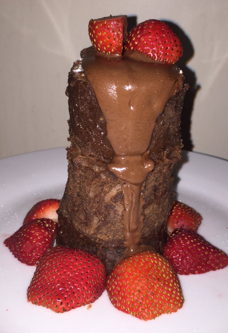 Hot chocolate mug cake. (mixed and cooked in a mug) with a garnish of hand reared strawberries and a drizzle of nutella #Mmmm