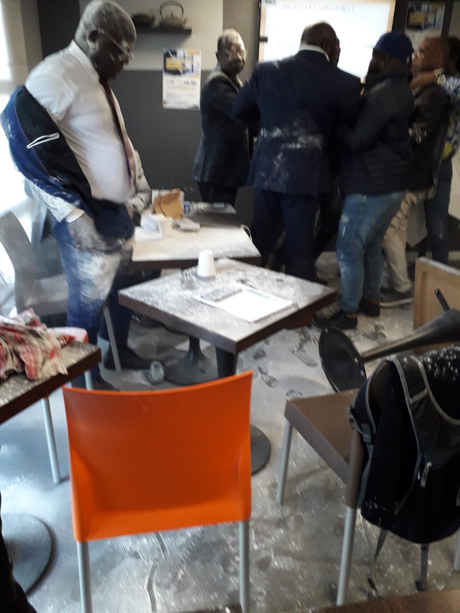 Farida_N's tweet photo. Togolese officials went to France yesterday to meet with the diaspora and they were received with flour. #Togodebout #Fauremustgo https://t.co/scsCkTfscc