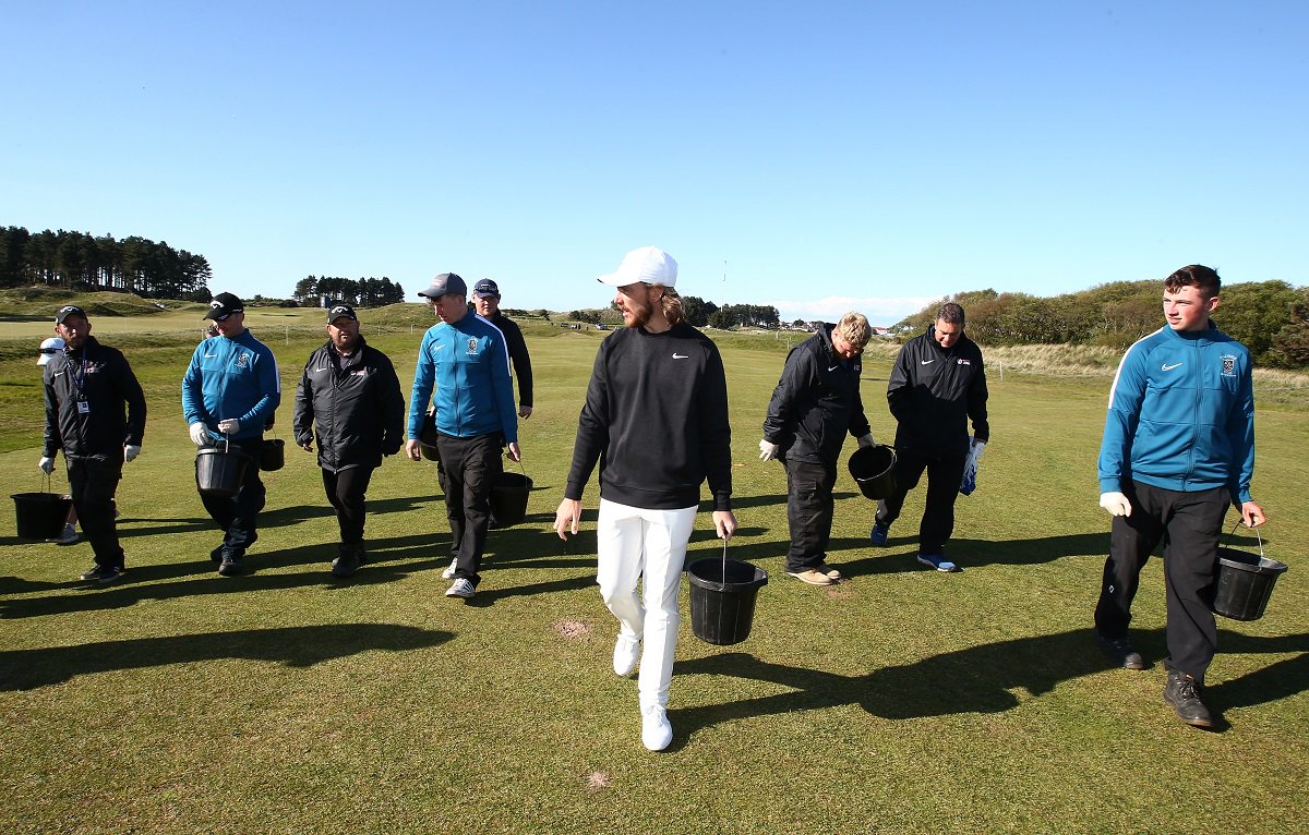 DPWorldTour's tweet photo. What a man.

After his 3rd round @TommyFleetwood1 went back out on the course to help the ground staff repair divots. https://t.co/xUK5J0KKaw