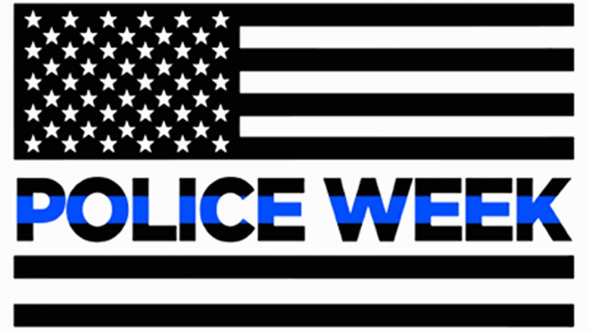Image shows an American flag with “Police Week” across the middle section.