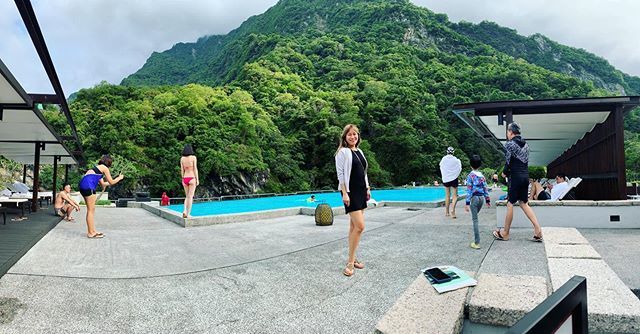 My beautiful wife at a legit hotel in the middle of a gorgeous national park in Taiwan. Please ignore the influencer shoot in the background. bit.ly/2WxYjvP