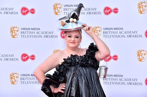 charliecooper11's tweet photo. My sister in a bin bag. At the baftas. Designed by our mum. The fookin nut bag ♥️ https://t.co/WEJb7uBw7t