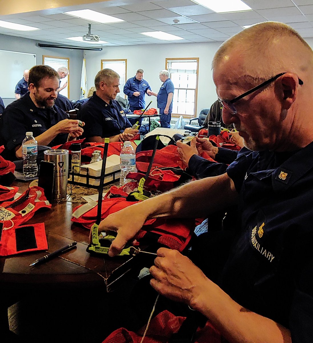 CGauxPA's tweet photo. #USCG Auxiliary crews check through their #SAR vests and test personal locator beacons in preparation for the 2019 boating season. @USCGGreatLakes @USCGAux #boating #SafetyFirst https://t.co/aJj6Chjbdu