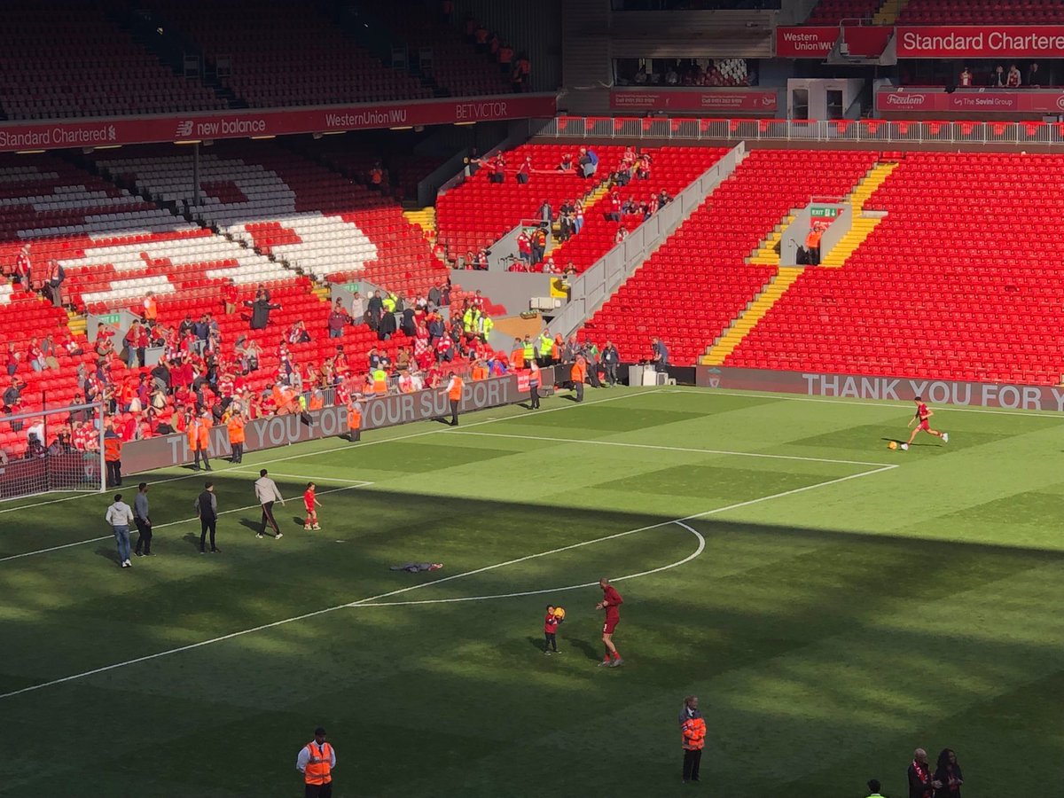 BSmith's tweet image. Trent Alexander-Arnold is still playing out on the pitch, currently putting crosses in for his mates at the Anfield Rd end. #LFC #LFCWOL