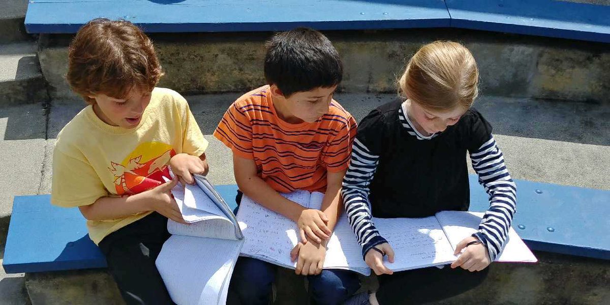 2nd Graders share their poetry in the sunshine!