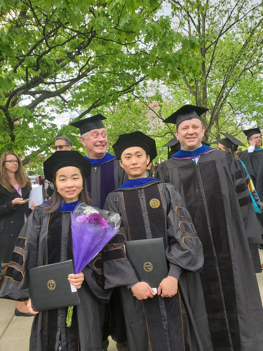 Two proud advisors with their biochemistry PhD students Peng Wang and Longyun Guo#PurdueWeDidIt