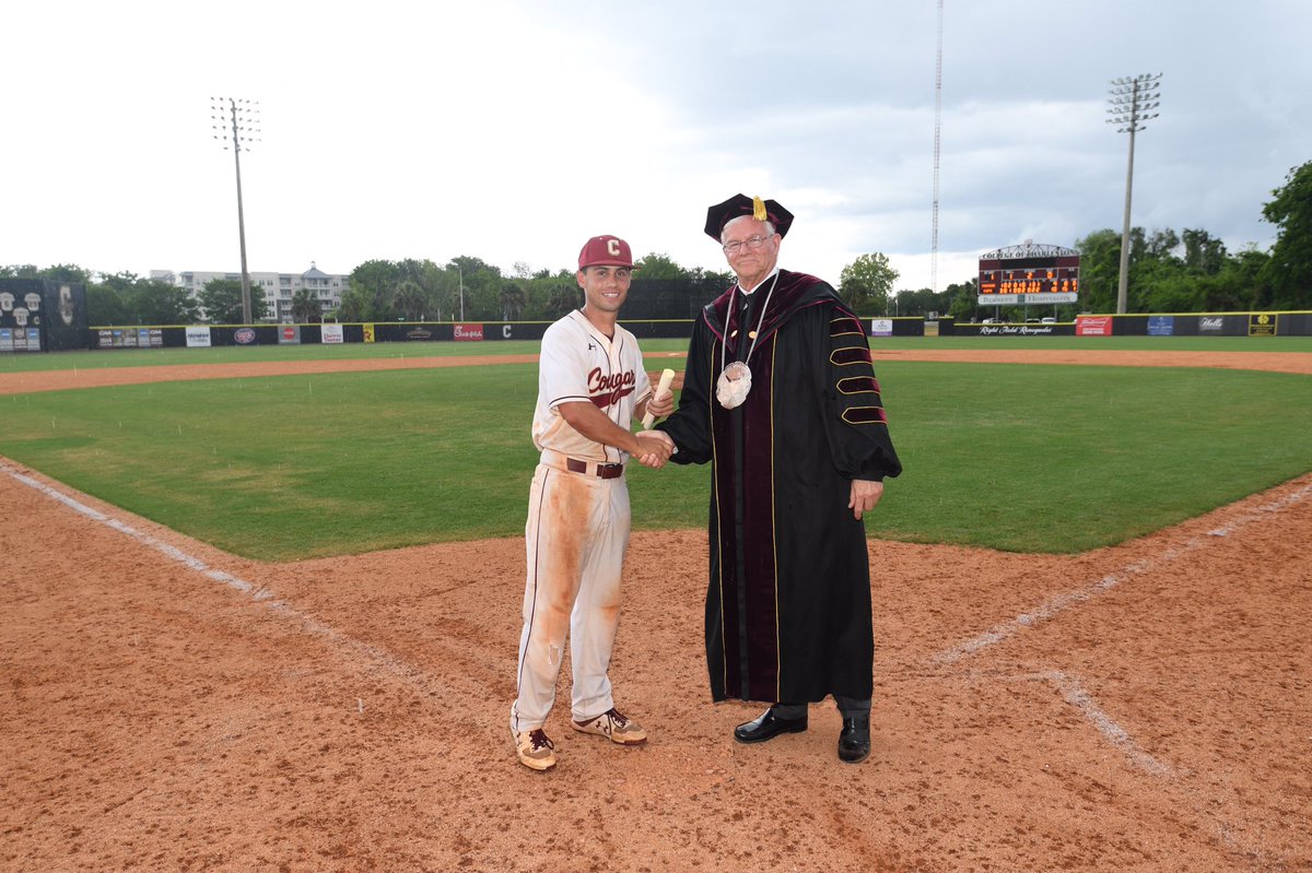 CofCSports's tweet photo. THREAD: After today’s @CofCBaseball game, President Osborne presented the graduating seniors with their diplomas on the field. Congratulations to all 11 seniors! #HailAllHail #comeCus https://t.co/xeIFuG5v0v