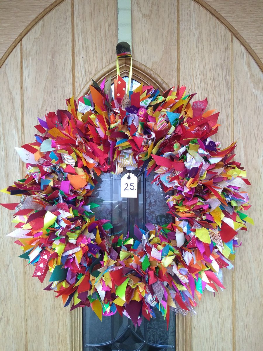 spriggit's tweet photo. Carnival colours on two of these Each upcycled ribbon sewn on by hand using approximately 2000 ribbons. Available to buy at The Nook Designs £25 inc. postage.#upcycling #saveandreuse #uniquecraft #wreath https://t.co/giIRujTDNf